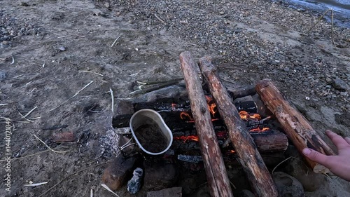 Wallpaper Mural Making a drink on a fire in the forest. Tea. Coffee on the fire. Torontodigital.ca