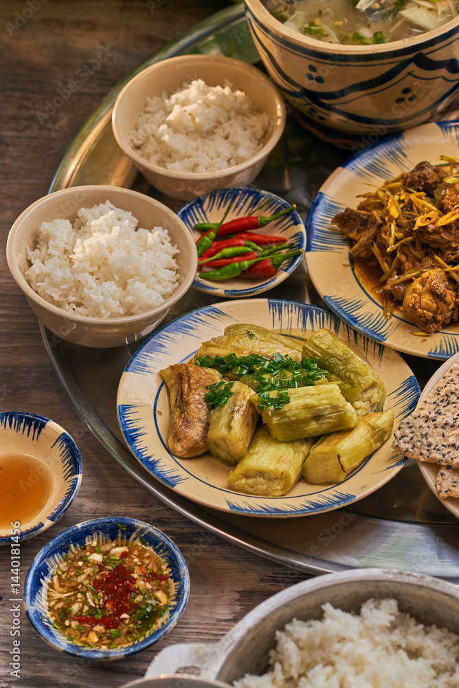Traditional Vietnamese Food in wooden table with Green background
Traditional Vietnamese Food in wooden table with Green background