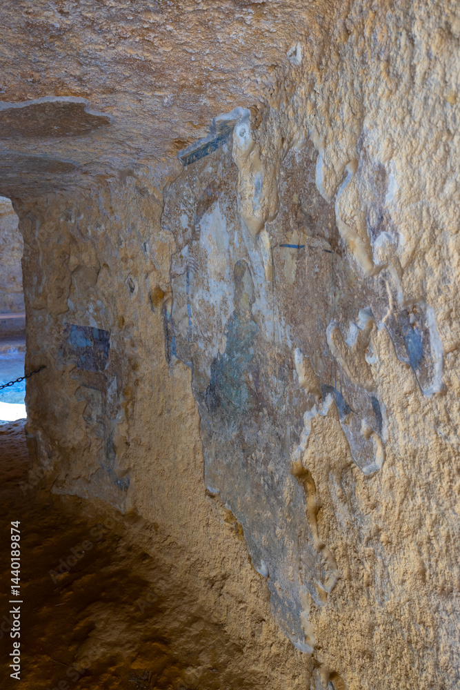 Interior of a tholos tomb showing corbelled dome and columns in Carmona, Spain