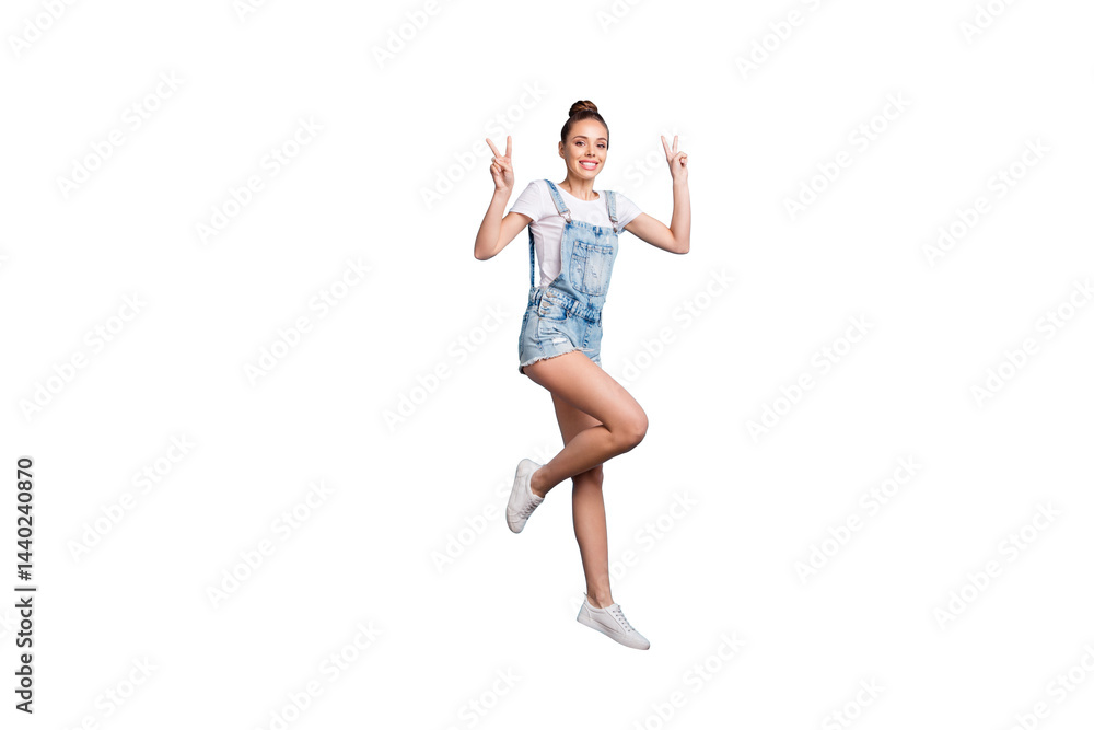 Full length body size photo of charming nice girl showing you v-sign while isolated with blue background Full length body size photo of charming nice girl showing you v-sign while isolated with blue background