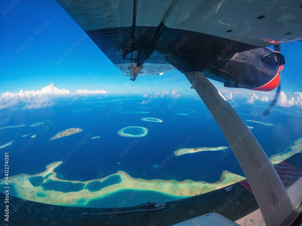 Fototapeta premium Beautiful maldives tropical island atoll - Panorama. view from the air.