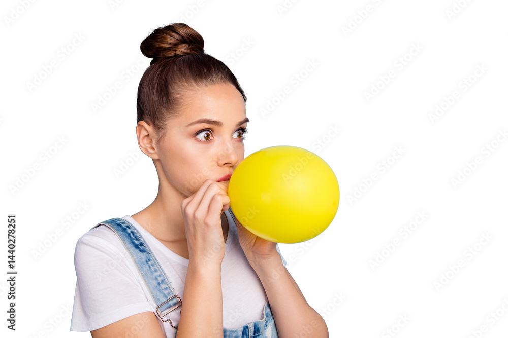 Turned photo of shocked person inflating baloon looking wearing white t-shirt denim jeans overall isolated over blue background Turned photo of shocked person inflating baloon looking wearing white t-shirt denim jeans overall isolated over blue background