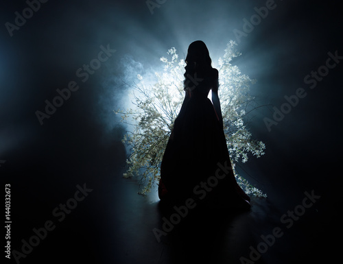 art photo real person fantasy girl princess black shadow silhouette walking in saint divine moon light ray in night dark spring forest fog tree white flowers tree. sexy goddess fairy elf woman ghost