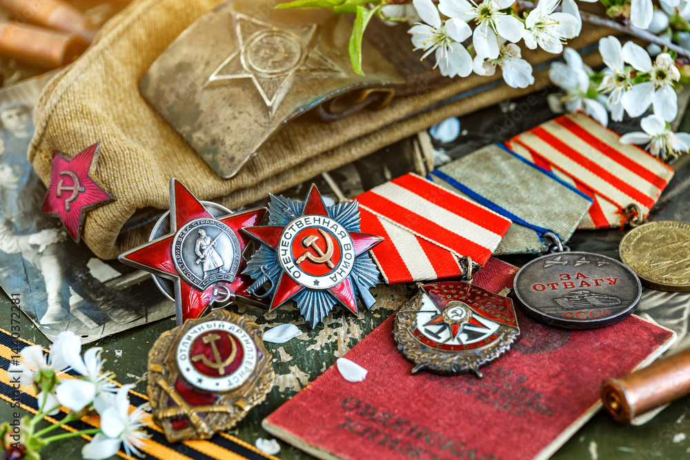 Naklejka premium Orders and medals of the USSR.Awards of the Second world war close-up.Victory Day - 9 of may 1945. Soviet military awards.Phaleristics.Antikvariat.