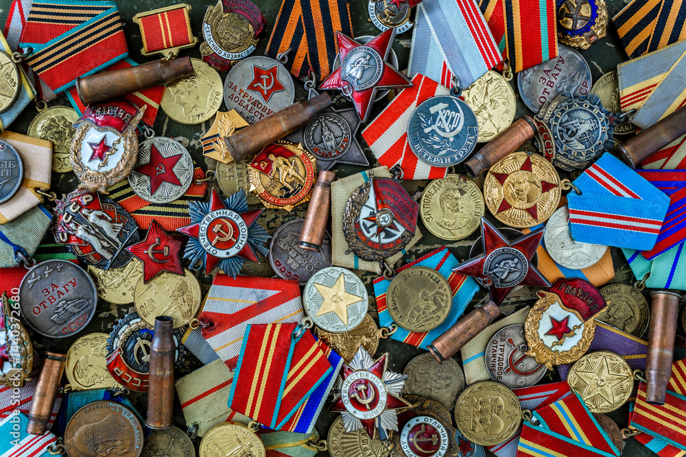 Fototapeta premium Orders and medals of the USSR.Awards of the Second world war close-up.Victory Day - 9 of may 1945. Soviet military awards.Phaleristics.Antikvariat.