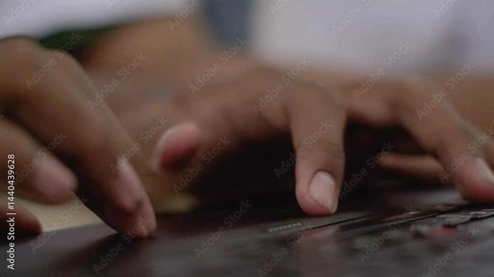 Close up of male finger using a laptop trackpad scrolling website for shopping online and browsing the internet. Asian male Hand using a laptop touch pad searching for knowledge and information. Close up of male finger using a laptop trackpad scrolling website for shopping online and browsing the internet. Asian male Hand using a laptop touch pad searching for knowledge and information.