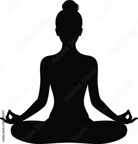 Woman in yoga lotus position silhouette practicing meditation for mindfulness and relaxation