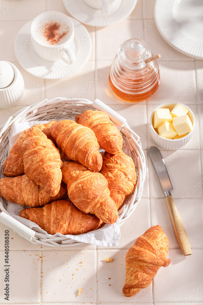 Hot and golden french croissants for sweet breakfast.