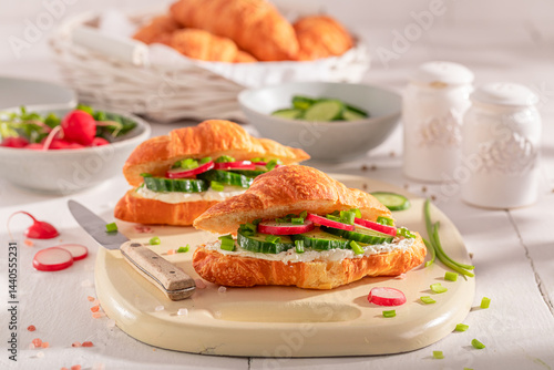 Obraz na płótnie Golden and healthy french croissant in spring morning. w salonie