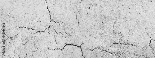 Cracked asphalt ground texture background with white paint