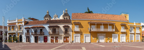 Panorama of historic buildings along the Plaza de la Aduana, in the Old Town, Cartagena, Colombia