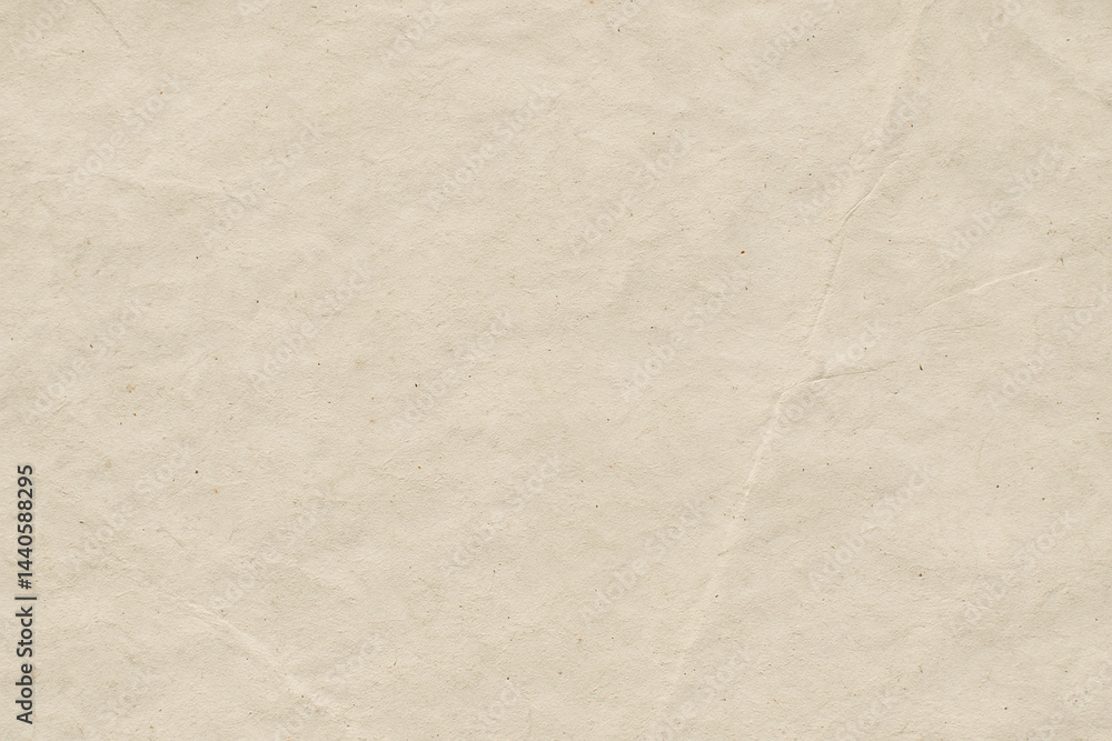 Fototapeta premium Close up of abstract texture showing beige paper surface with subtle wrinkles and natural fibers creating soft tactile feel