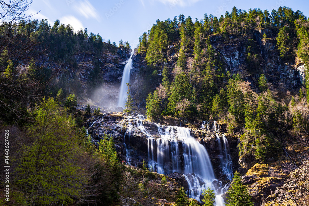 Long exposure view of the Ars Waterfall, swollen by the melting spring snow, in the Pyrenees region of Haut-Couserans, Ariège