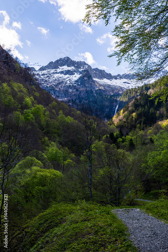 Obraz na płótnie Snow-capped Pique Rouge de Bassiès Mountain in spring, seen from the hiking trail to the Ars Waterfall in Haut-Couserans, Ariège w salonie