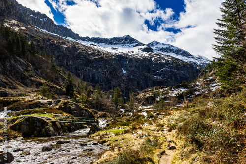 Obraz na płótnie Snow-capped Pique Rouge de Bassiès Mountain in Spring from the Plateau above the Ars Waterfall in Haut-Couserans, Ariège w salonie