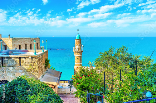 The old minaret of Al-Bahr Sea Mosque in Jaffa against the sea, Tel Aviv, Israel