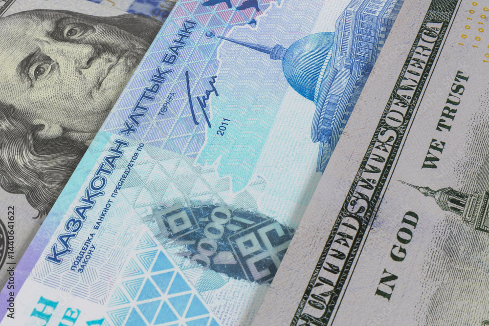 Fototapeta premium Banknotes of Kazakhstani tenge and US dollar. Cash. Financial concept.