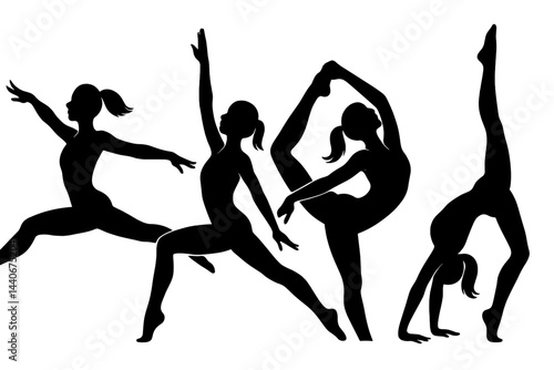 Dynamic ballet dancers performing elegant movements in silhouette form against a plain backdrop during a dance rehearsal