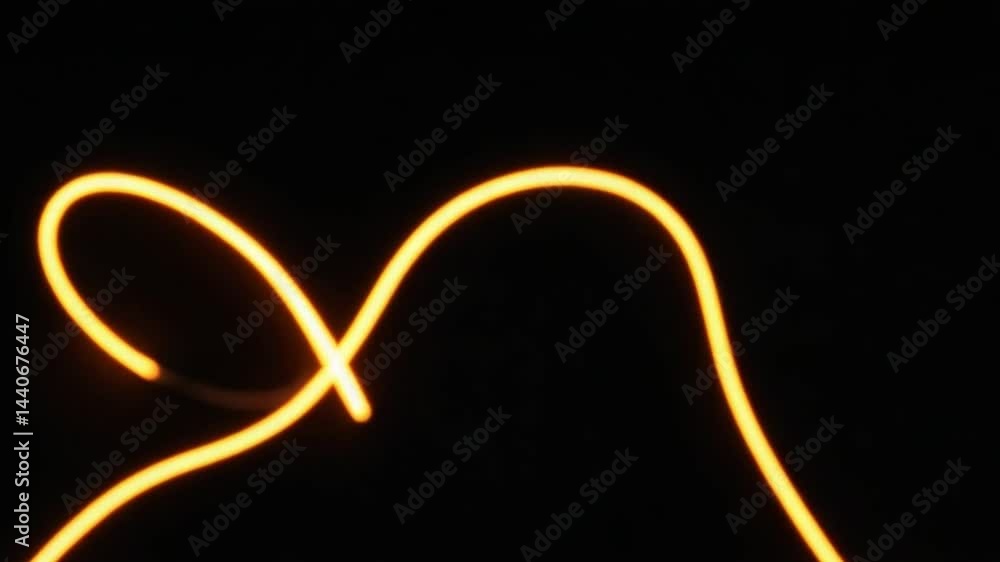 Abstract light trail on black flowing bright lines Abstract light trail on black flowing bright lines