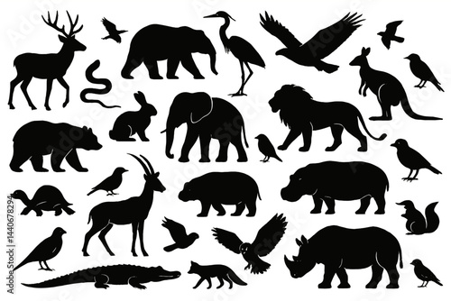 Silhouettes of various animals including mammals, birds, and reptiles in a natural setting at twilight