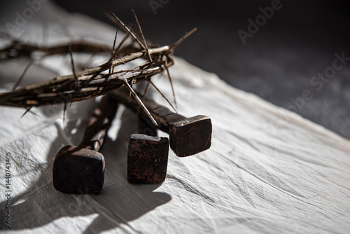 Crown of Thorns and Holy Nails associated with the Passion of Jesus Christ. Symbol of the Crucifixion at Calvary and Good Friday in Christianity according to the New Testament