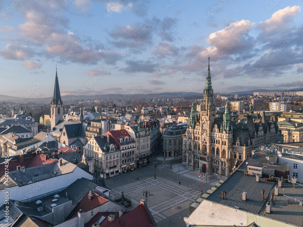 Skyline cityscape of Liberec, Czech Republic. Panoramic aerial view of the old town (staré město): main square and city hall at sunset