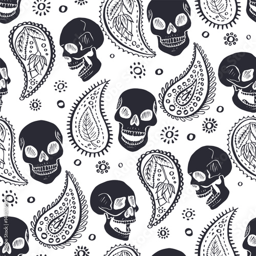 Seamless pattern with hand drawn inky floral skulls surrounded by paisley. Skeleton heads monochrome black and white repeat background.