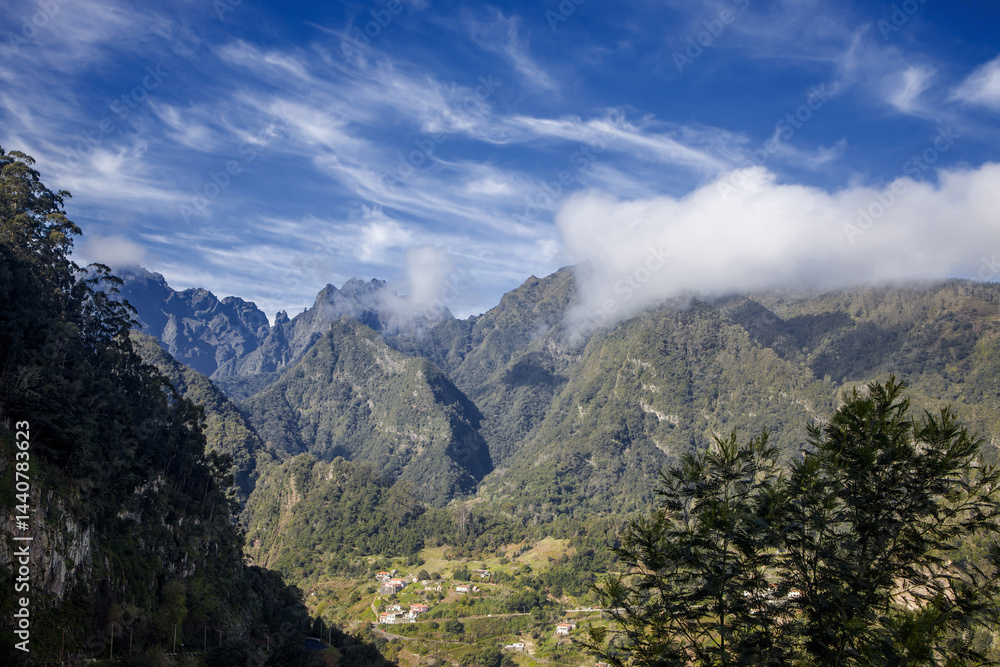 Explore the breathtaking views along Levada dos Balcoes in Madeira's stunning mountainous landscape