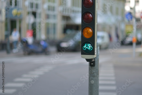 Photography Green bicycle traffic light on a road
