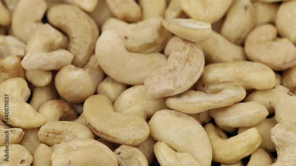 Cashews displayed in a close-up view showcasing their unique shapes and creamy texture for a healthy snack option Cashews displayed in a close-up view showcasing their unique shapes and creamy texture for a healthy snack option