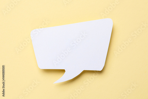 Blank speech bubble on beige background. Space for text