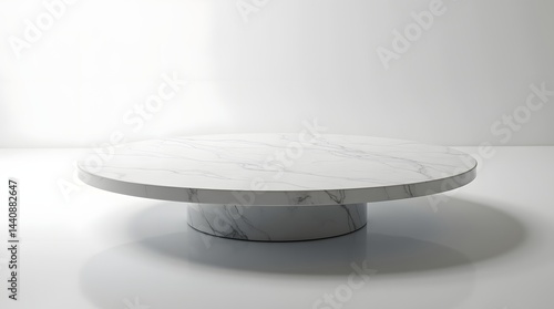 Stylish contemporary round marble coffee table on a minimalist background, showcasing elegant design and smooth texture.