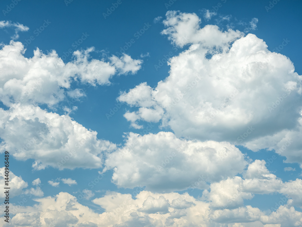 Fototapeta premium seascape with light white clouds in blue skue