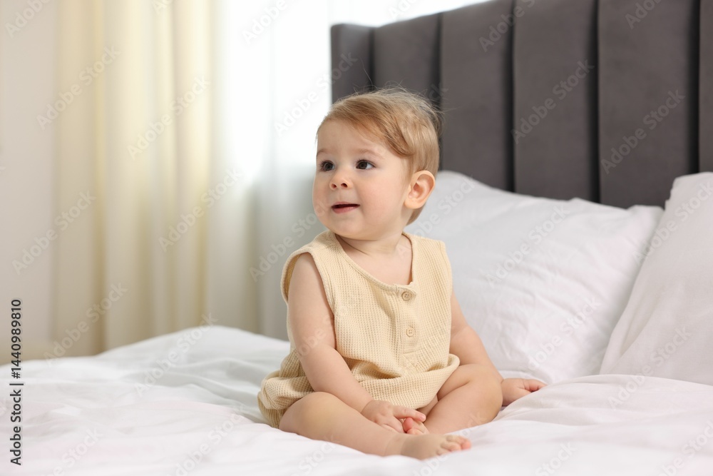 Cute little baby on bed at home Cute little baby on bed at home