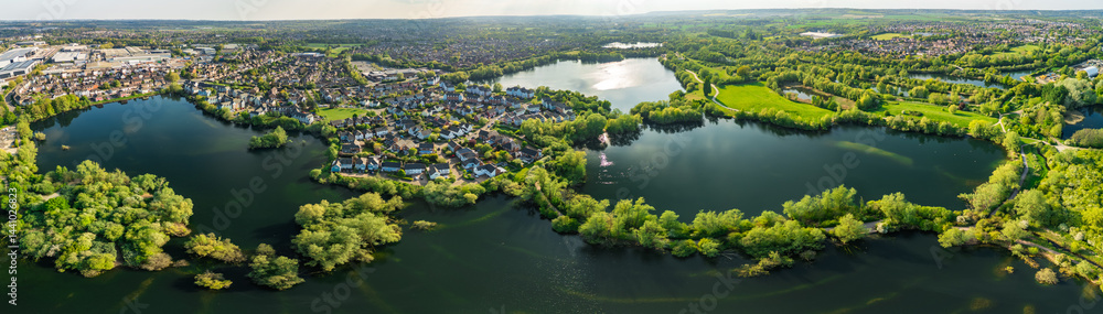 Fototapeta premium Aerial drone view of .Leybourne Lakes and housing estate, Aylesford, Kent, England