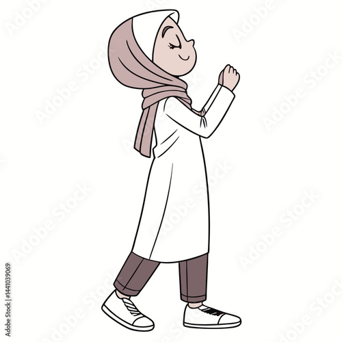 Young woman in hijab walking