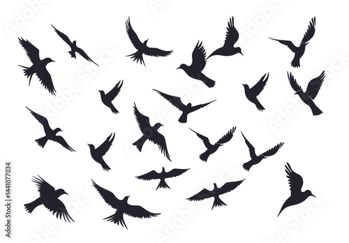 Silhouetted birds soar in a scattered flock, creating a dynamic and captivating aerial display.