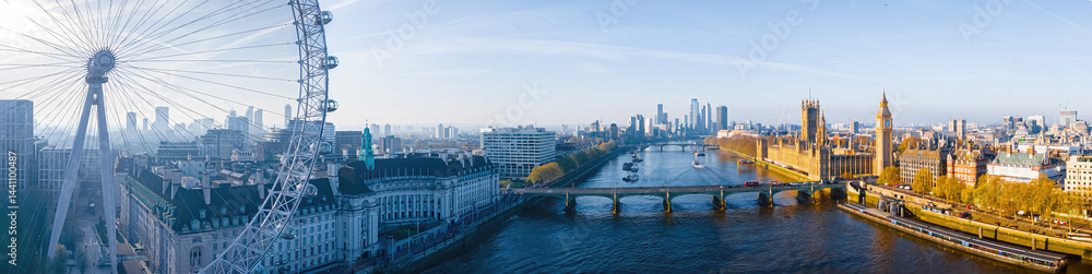 Fototapeta premium Iconic London skyline with London Eye in morning light over the Thames