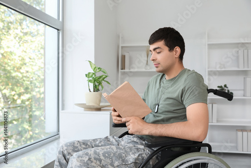 Young soldier in wheelchair...