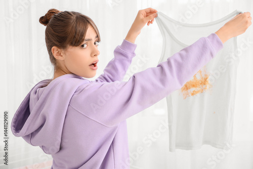 Shocked young woman with st...