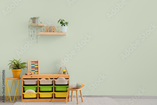 Obraz na płótnie Interior of children's room with shelves, plants and toys w salonie