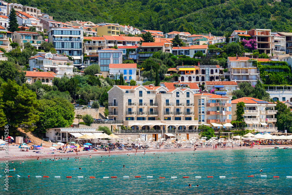 Beachfront hotels on Sveti Stefan Beach near Budva on the Montenegrin riviera, along the coast of the Adriatic Sea