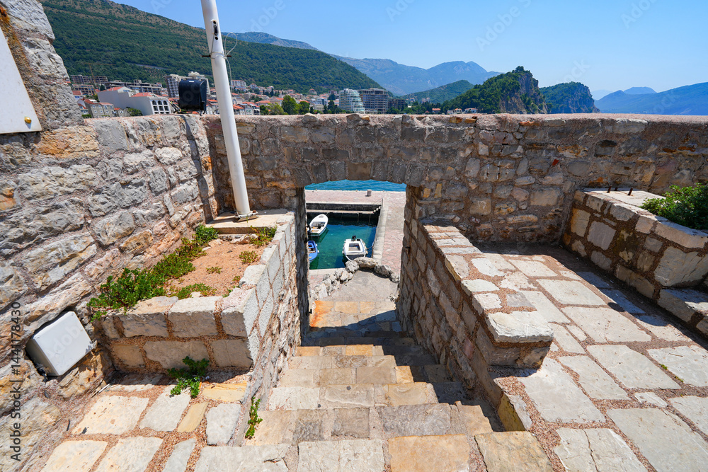Kastio Castle built on a peninsula in Petrovac na Moru, a resort town located on the coast of the Adriatic Sea in Montenegro