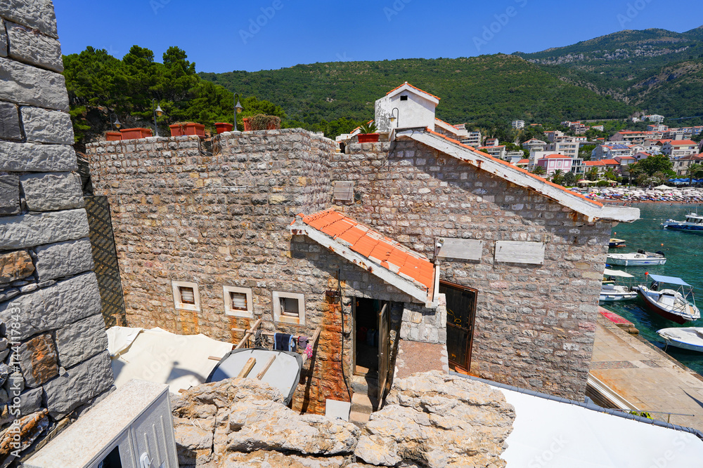 Kastio Castle built on a peninsula in Petrovac na Moru, a resort town located on the coast of the Adriatic Sea in Montenegro
