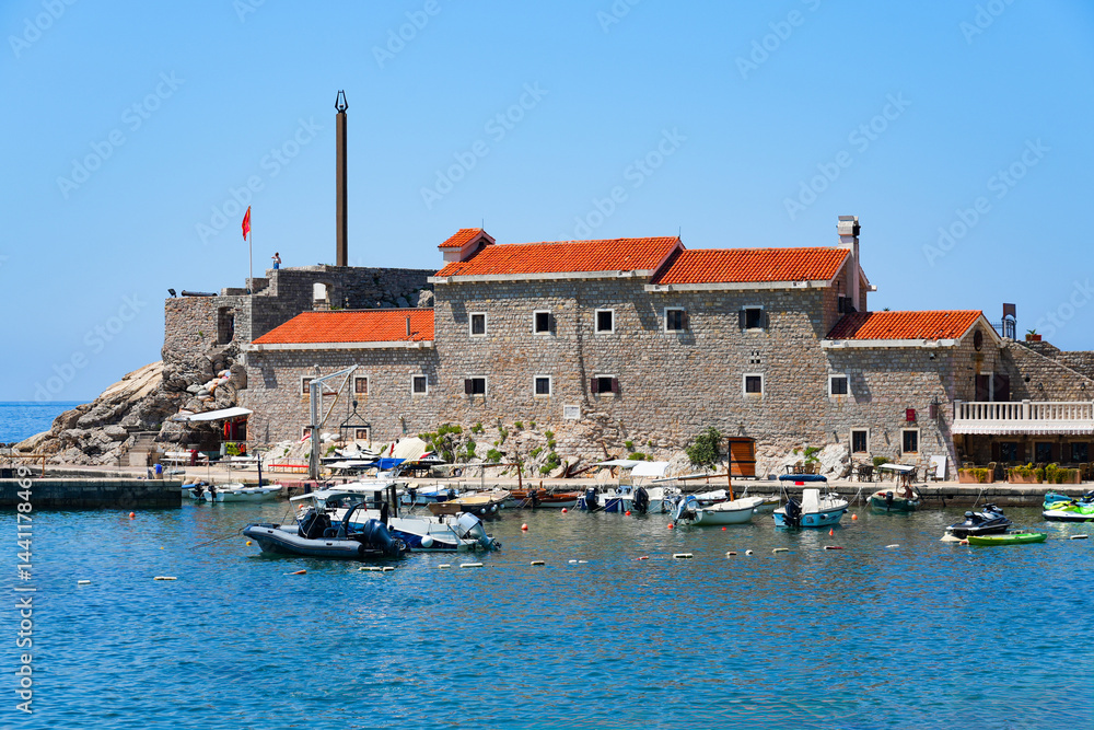 Kastio Castle built on a peninsula in Petrovac na Moru, a resort town located on the coast of the Adriatic Sea in Montenegro