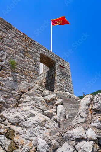 Obraz na płótnie Kastio Castle built on a peninsula in Petrovac na Moru, a resort town located on the coast of the Adriatic Sea in Montenegro w salonie