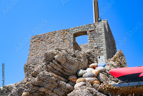 Obraz na płótnie Kastio Castle built on a peninsula in Petrovac na Moru, a resort town located on the coast of the Adriatic Sea in Montenegro w salonie
