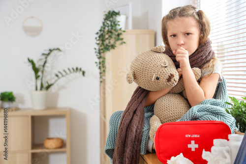 Sick little girl with sore ...