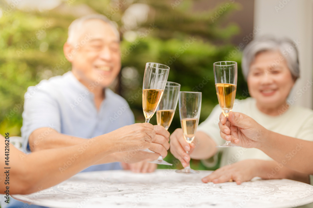 A group of people clink champagne glasses together in a celebratory toast. The image conveys joy, celebration, and togetherness in an outdoor setting, symbolizing special moments and shared happiness. A group of people clink champagne glasses together in a celebratory toast. The image conveys joy, celebration, and togetherness in an outdoor setting, symbolizing special moments and shared happiness.
