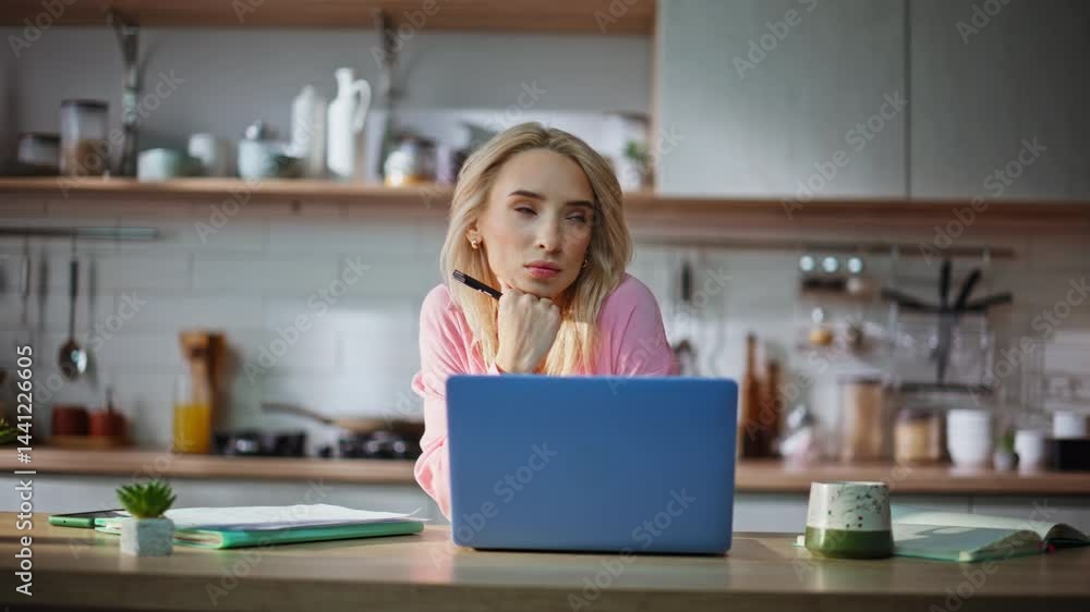 Pensive writer holding pen looking for inspiration creating book at home closeup Pensive writer holding pen looking for inspiration creating book at home closeup